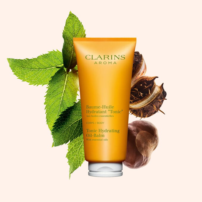 Clarins Baume Huile Hydratant "Tonic" com &oacute;leo de avel&atilde; e manteiga de karit&eacute;, para uso di&aacute;rio, para uma pele do corpo intensamente nutrida e tonificada.