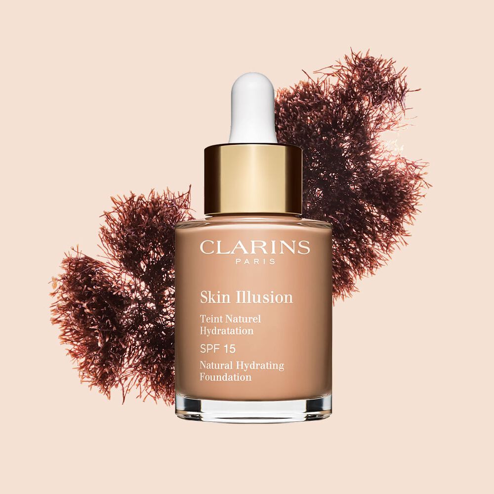 A base semelhante a s&eacute;rum Skin Illusion Clarins, com SPF 15, proporciona um resultado de base uniforme e natural.