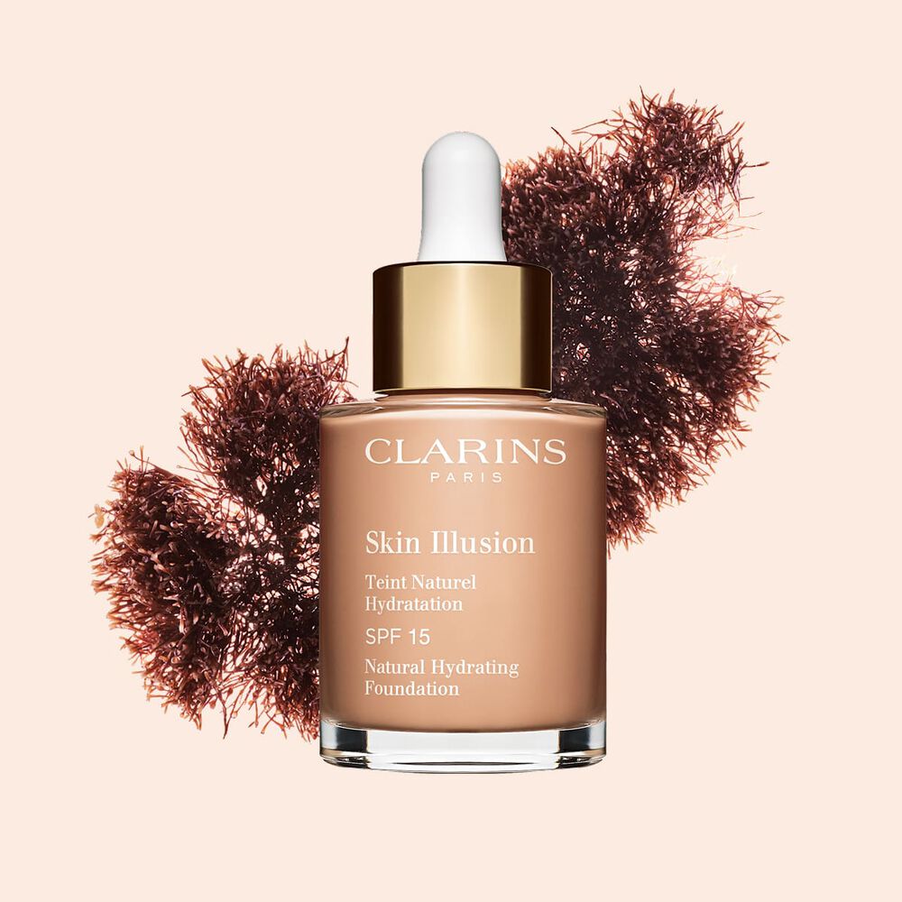 A base semelhante a s&eacute;rum Skin Illusion Clarins, com SPF 15, proporciona um resultado de base uniforme e natural.