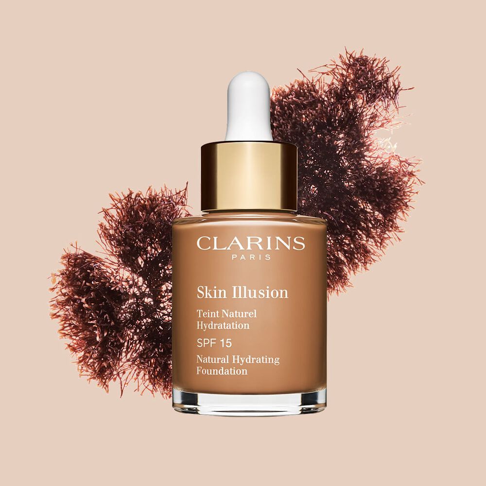 A base semelhante a s&eacute;rum Skin Illusion Clarins, com SPF 15, proporciona um resultado de base uniforme e natural.