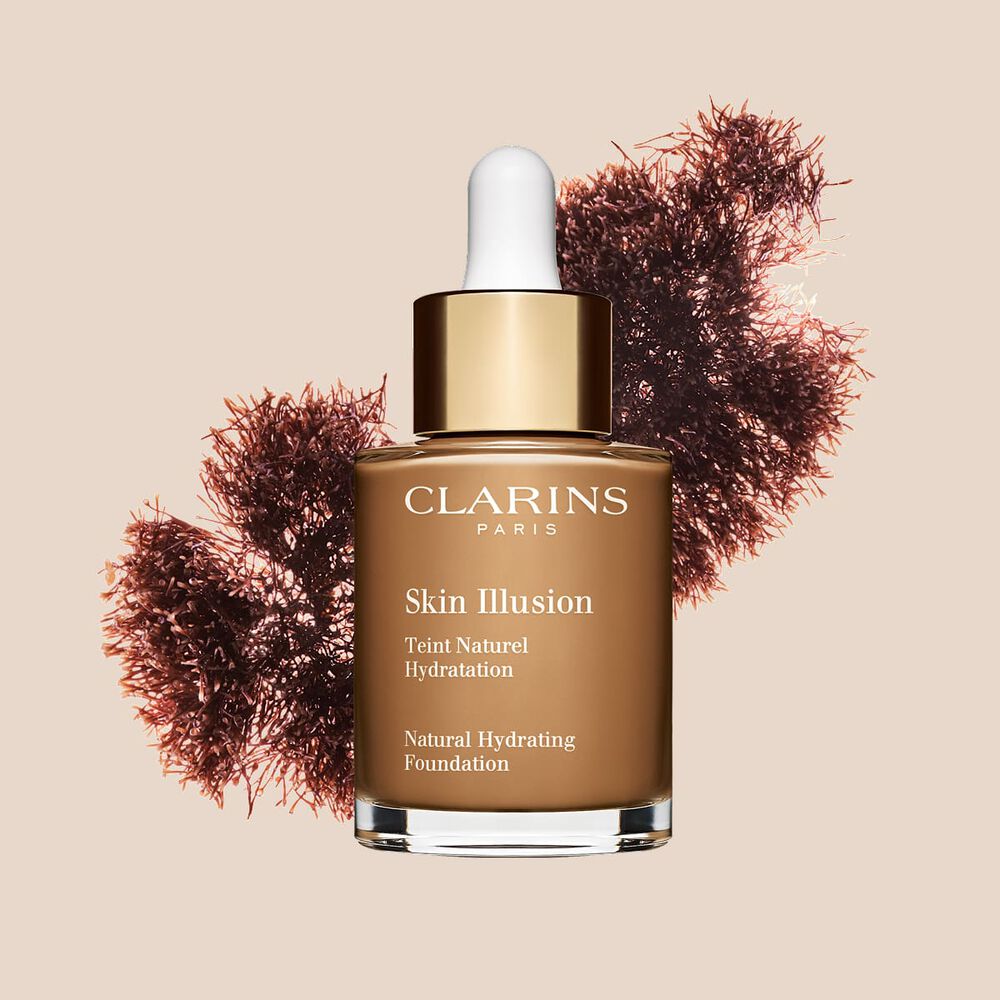 A base semelhante a s&eacute;rum Skin Illusion Clarins, com SPF 15, proporciona um resultado de base uniforme e natural.