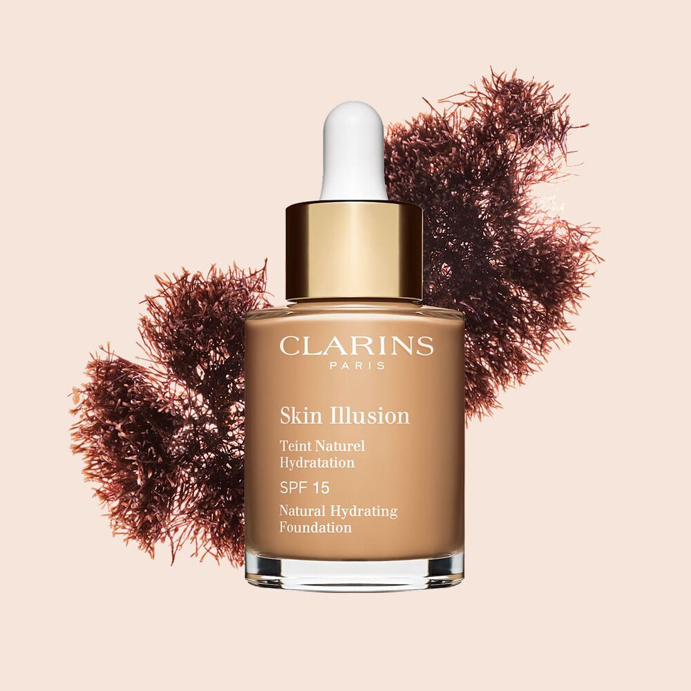 A base semelhante a s&eacute;rum Skin Illusion Clarins, com SPF 15, proporciona um resultado de base uniforme e natural.