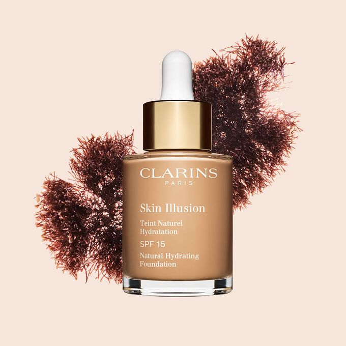 A base semelhante a s&eacute;rum Skin Illusion Clarins, com SPF 15, proporciona um resultado de base uniforme e natural.
