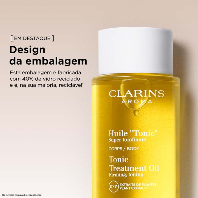 Clarins Huile "Tonic" para o corpo, numa embalagem fabricada com vidro reciclado, que apoia pr&aacute;ticas de beleza sustent&aacute;veis.