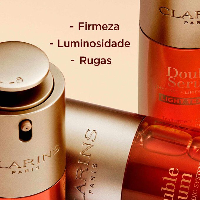 Grande plano dos frascos Clarins Double Serum Light Texture, realçando o aumento da firmeza, da luminosidade e a redução das rugas.